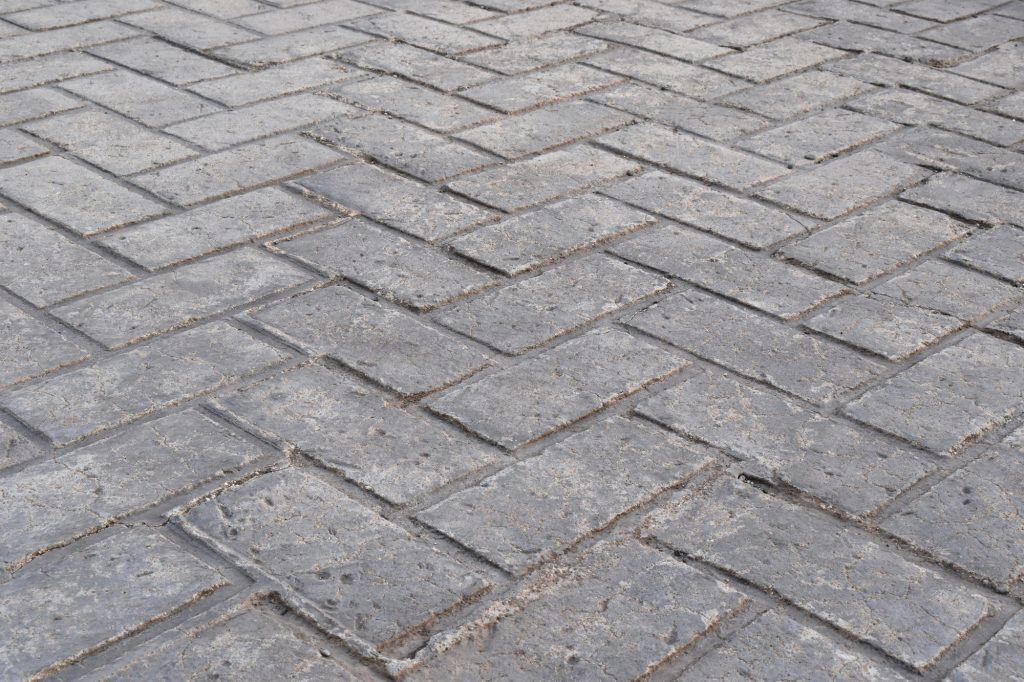 Stamped concrete floor texture background.